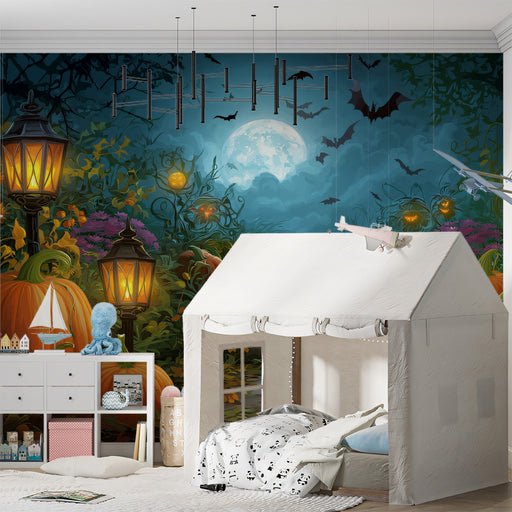 Children's playroom with a Halloween-themed wall mural featuring pumpkins, bats, and a full moon.