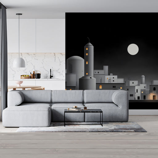 Modern living room with a gray sectional sofa and a cityscape wall art.