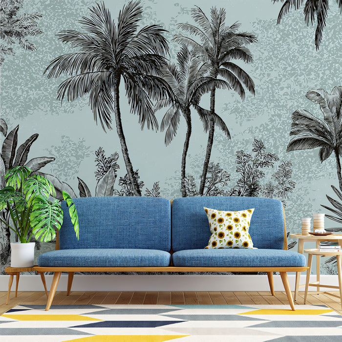 Blue sofa with a decorative pillow in front of a tropical wall mural with palm trees.
