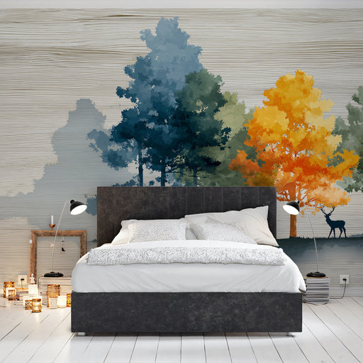 Bedroom with a large bed against a wall featuring artistic tree mural.