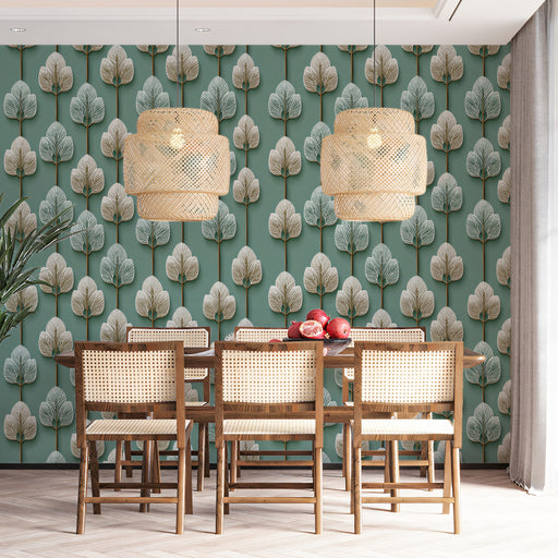 Dining area with wooden table and chairs against a wall with tree-patterned wallpaper.