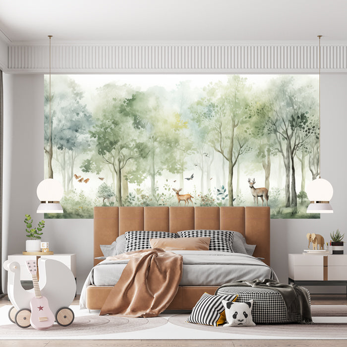A bedroom with the focus on a wall featuring a watercolor forest mural wallpaper with green, white, and brown colors. The wall showcases a serene forest scene with deer, trees, and birds.