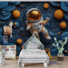 Astronaut in Space Mural Wallpaper in Child's Room | Blue, Orange, and Yellow Astronaut