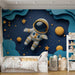 Astronaut in Space Mural Wallpaper in Child's Room | Blue, Orange, and Yellow Astronaut -1