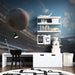 Kid’s room with soccer stadium wall decor and green rug accents