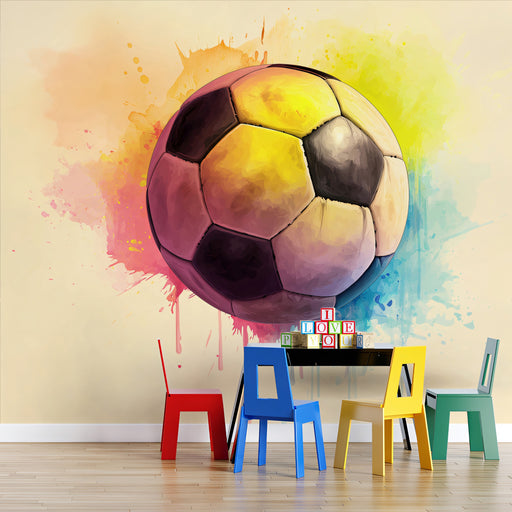 Colorful soccer ball wall mural in a room with children's furniture.
