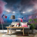 Sports themed home theater with stadium mural on the main wall behind the bed