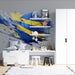 A stylish study or recreational area featuring the energetic blue and yellow sports art mural on the main wall.