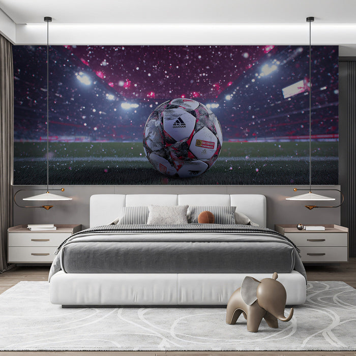 A bedroom with a sports themed wall mural creating an energetic atmosphere