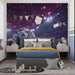 A home theatre room featuring a dramatic stadium mural wallpaper for a sports lover