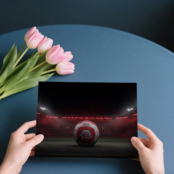 Red Spotlight Soccer Ball Mural Wallpaper | Dark Stadium, Central Focus, Monochromatic Red Drama