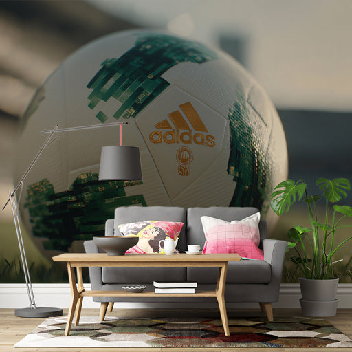 Game room interior with a contemporary athletic-themed mural behind a television console