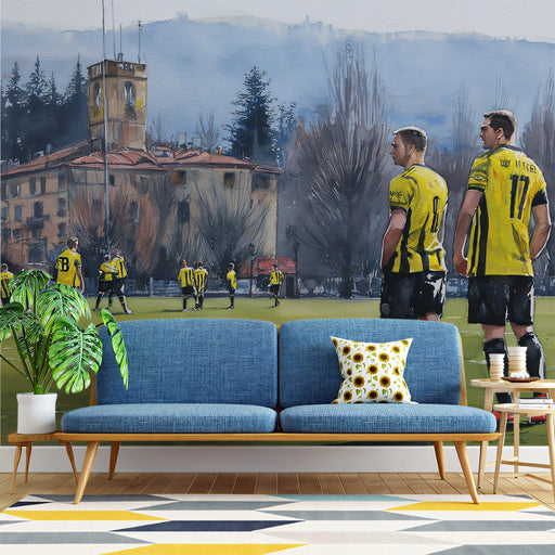 A modern basement home gym featuring a soccer field mural on the main accent wall behind gym equipment.