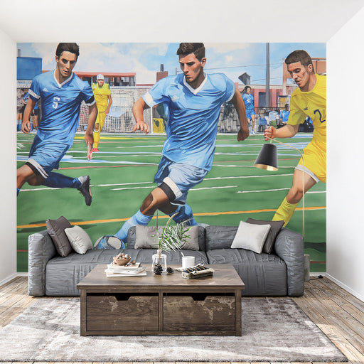 A game room or basement lounge decorated with a vibrant soccer match wall mural