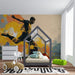 Bedroom with an energetic soccer mural, inspiring an active workout atmosphere.