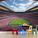 Wide angle stadium wallpaper design in a basement lounge area
