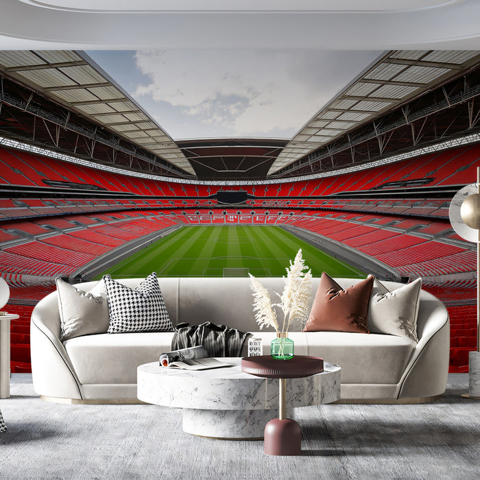 Empty Stadium Red Seating Mural Wallpaper | Symmetrical Interior, Clean Pitch, High-Contrast Red and Green