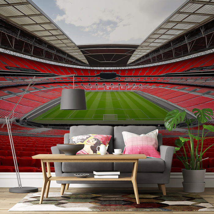 Empty Stadium Red Seating Mural Wallpaper | Symmetrical Interior, Clean Pitch, High-Contrast Red and Green