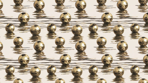 Pattern of gold beads on a reflective surface