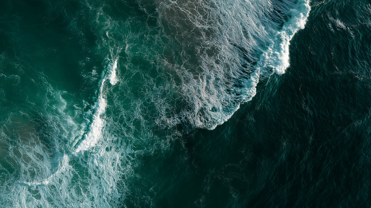 Deep Ocean Surf Aerial Mural Wallpaper | Dark Teal and White Foam, High-Contrast Texture, Powerful Motion