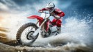 Motorcyclist riding through water on a dirt bike with a dynamic background