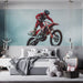 Bedroom with a large wall mural of a motocross rider on a red bike.