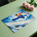 Artistic depiction of a snowboarder on a placemat with pink roses on a green surface