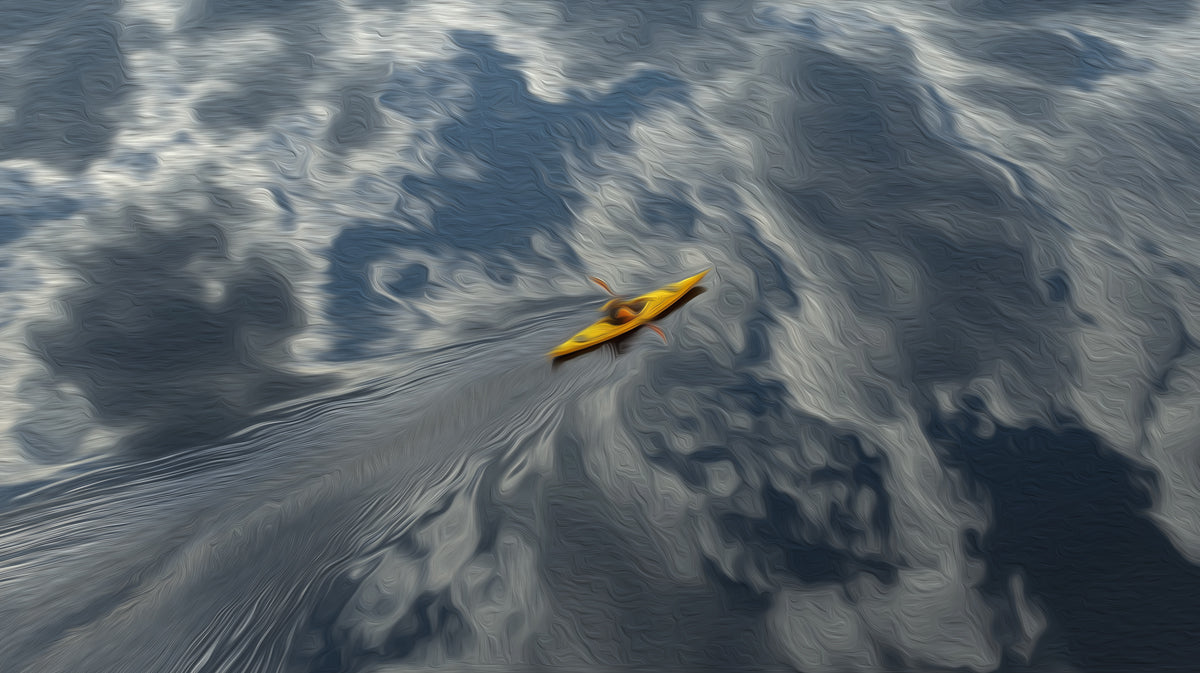 Yellow kayak on a body of water with cloud reflections