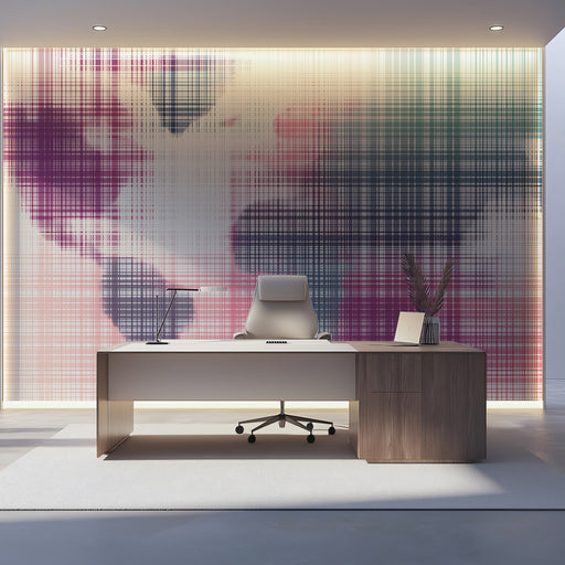 Modern office desk with chair against a colorful abstract wall.