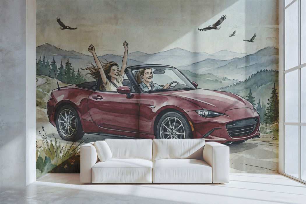 A creative home office wall featuring a watercolor mountain road trip mural above a simple wooden desk.