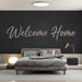 Modern entryway design with dark minimalist script mural wallpaper