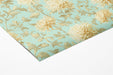 Chinoiserie-style floral wallpaper in a sophisticated home office setting with white desks.