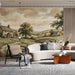 A charming dining room wall featuring a pastoral landscape mural with warm, rustic wooden decor.