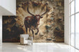 The bull mural installed in a modern home gym with industrial equipment.