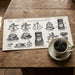 Sophisticated home office featuring detailed scientific instrument mural for an academic aesthetic