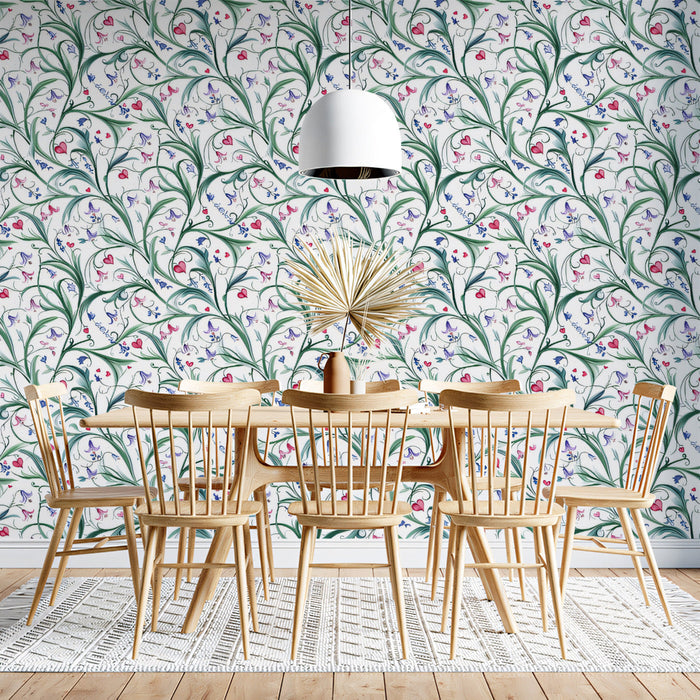 Flowing nature-inspired mural wallpaper as a feature wall in a cozy home office setup