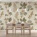A peaceful home office space styled with a traditional botanical fern mural.