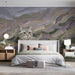 A creative home office space showing the expressive brushwork of the cat mural on the wall.