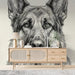 A cozy home study featuring a German Shepherd mural behind a solid wood desk and leather chair.