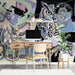 A modern study room with the whimsical octopus and owl mural as a focal point.