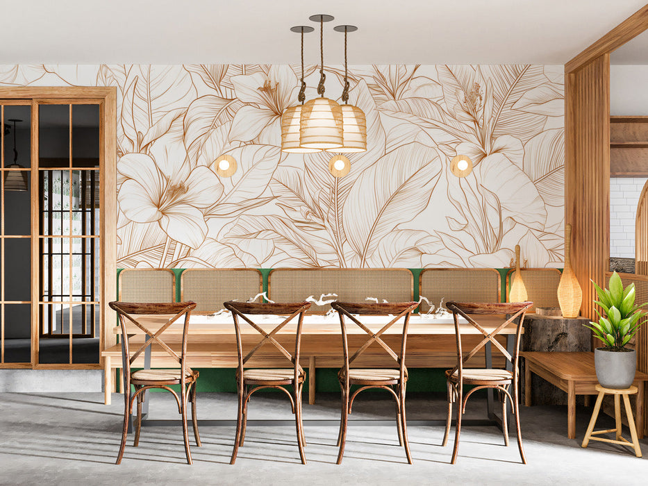 Modern home office featuring golden botanical line art wallpaper behind a minimalist white desk