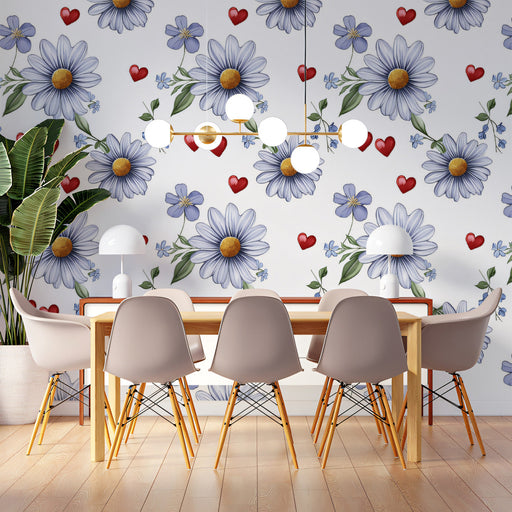 Soft floral and heart motif wallpaper creating a happy atmosphere in a child’s playroom with colorful toys.