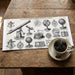 Library wall covered in vintage science sketches to create a scholarly and curious atmosphere
