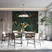 A sophisticated home office space decorated with a rich peacock and exotic plant jungle mural.
