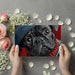 The character-filled pug mural used as an accent in a bright and creative home office space.