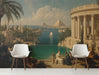 A sophisticated living room featuring the Mediterranean architectural mural as a grand focal point behind a velvet sofa.