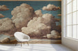 Vintage cloud mural installed in a cozy bedroom with warm wood furniture and soft lighting.