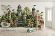 A child's bedroom featuring a whimsical castle mural on the wall above a cozy wooden bed.
