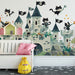 A nursery wall decorated with the cat pirate castle design for a creative and imaginative look