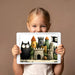 A fun and imaginative play area featuring the cat and castle mural on a feature wall.
